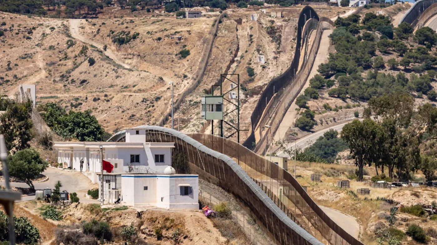 A view of the fence dividing Morocco and Melilla, the Spanish enclave in North Africa, photographed near Nador on 25 June 2022. Credit: AFP